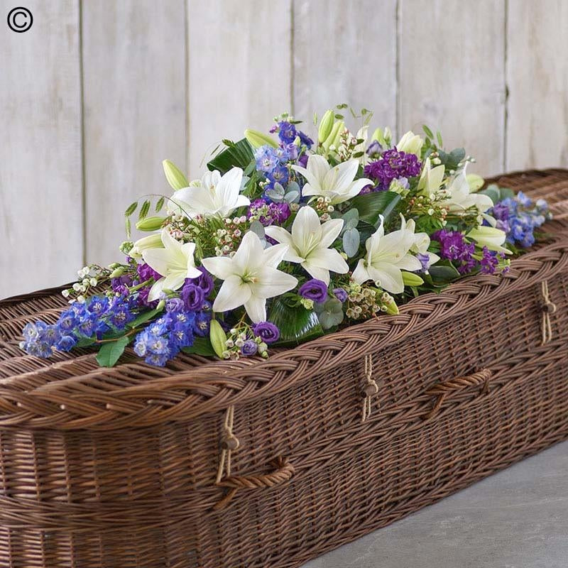 Florists Choice Blue and White Casket Spray