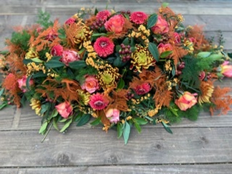Florists Choice Burnt Orange Casket Spray